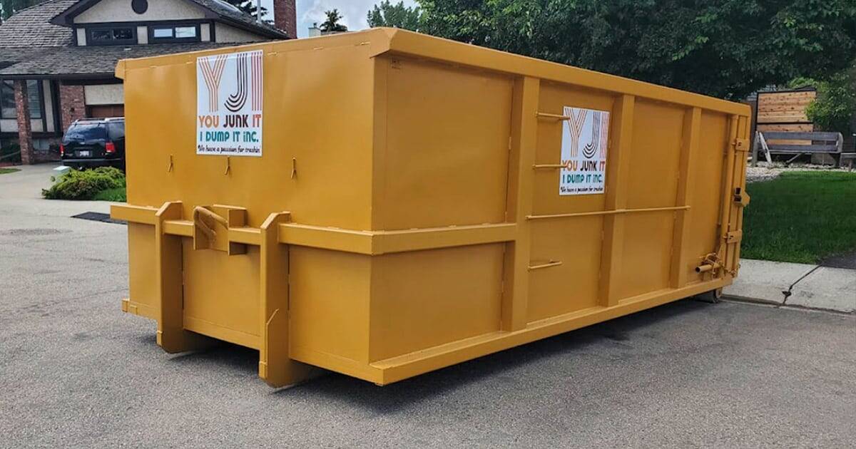Large yellow dumpster for waste collection and junk removal services.