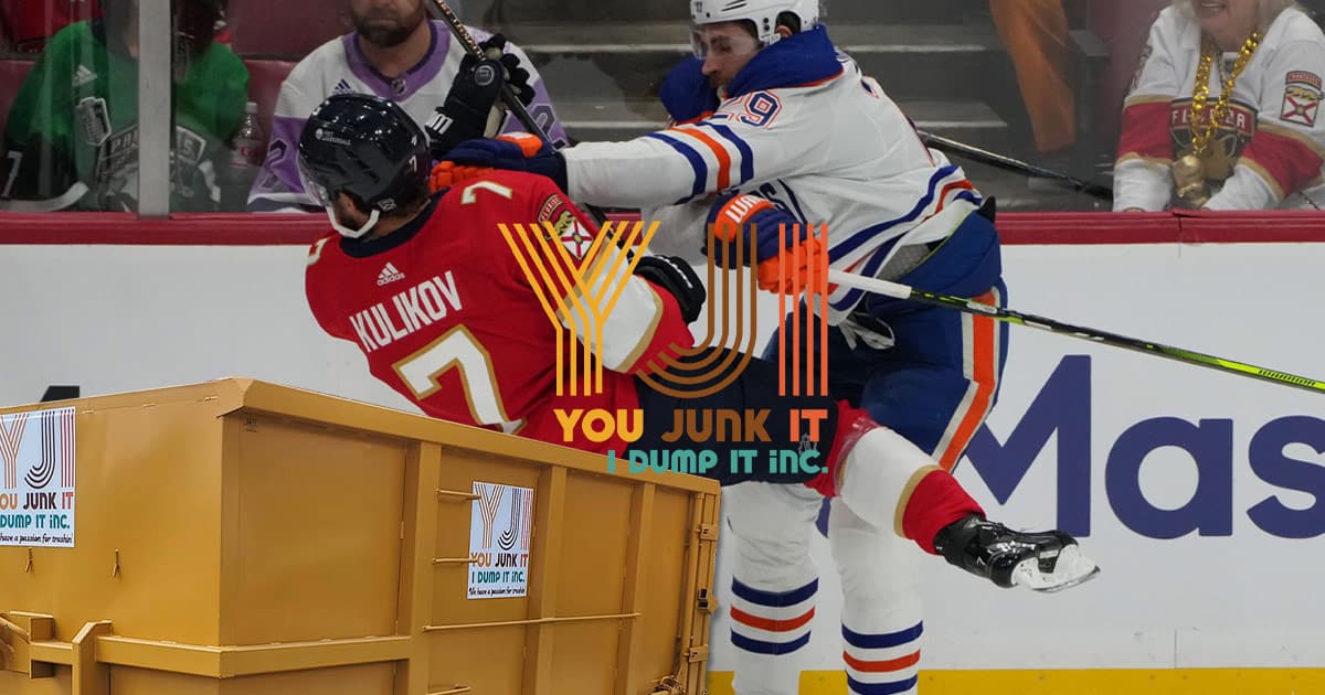 oilers player hitting florida player into a junk bin