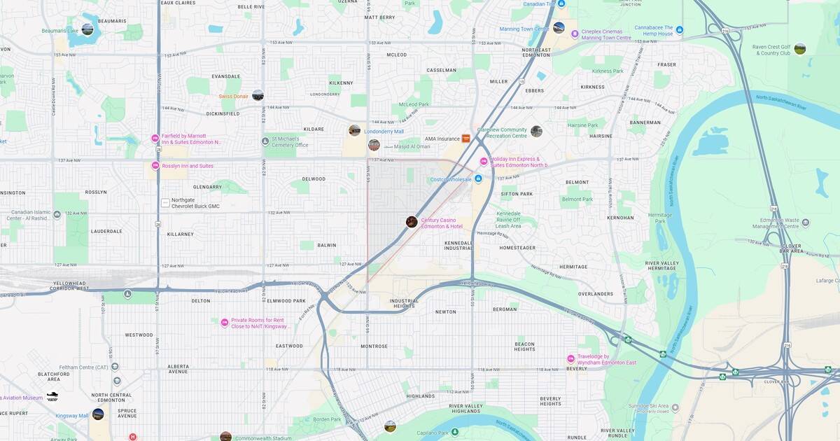 Detailed map of Edmonton, Alberta, highlighting key neighborhoods, landmarks, parks, transportation routes, hotels, attractions, and business districts for visitors and residents.