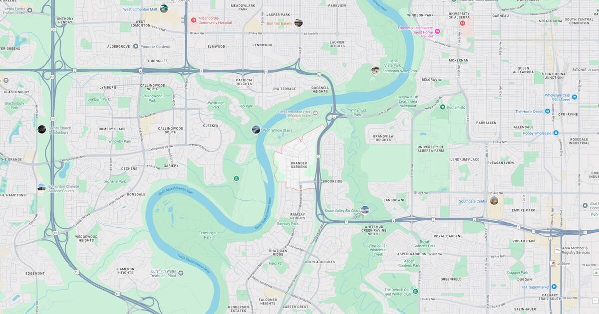 A detailed map showcasing the North Saskatchewan River flowing through Edmonton, including parks, neighborhoods, and key landmarks, providing an overview of natural and urban highlights.