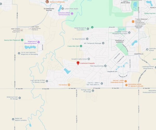 A scenic view of a city park at sunset, featuring walking trails, lush green areas, and a peaceful atmosphere ideal for outdoor activities and relaxation.