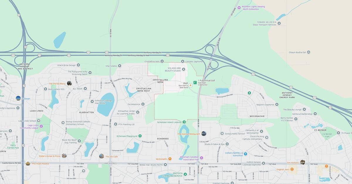 City park map with lakes, walking trails, and green spaces in a suburban neighborhood.