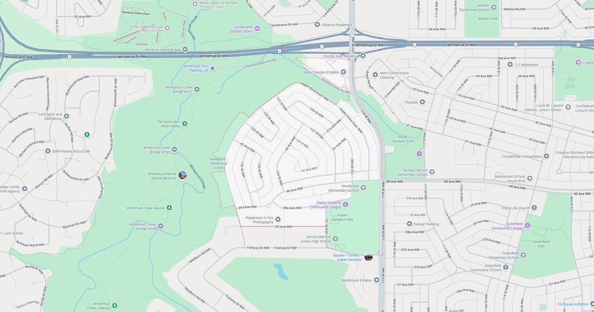 Detailed map of a residential suburban area with streets, parks, and water features.