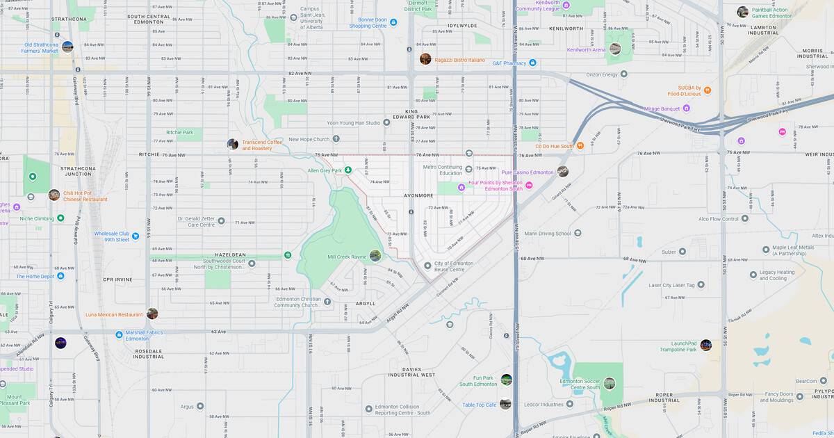 Detailed city map highlighting streets, green parks, and transit lines for navigation and urban planning.