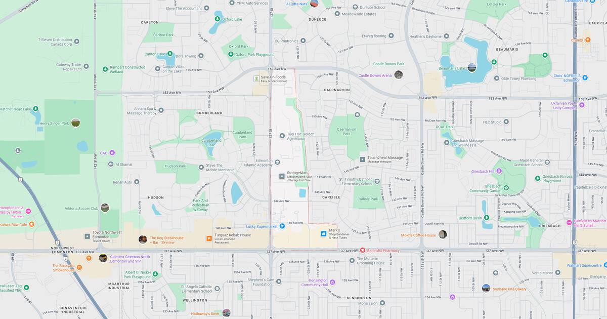 Detailed city map highlighting streets, parks, lakes, and public transportation routes for navigation and urban planning.